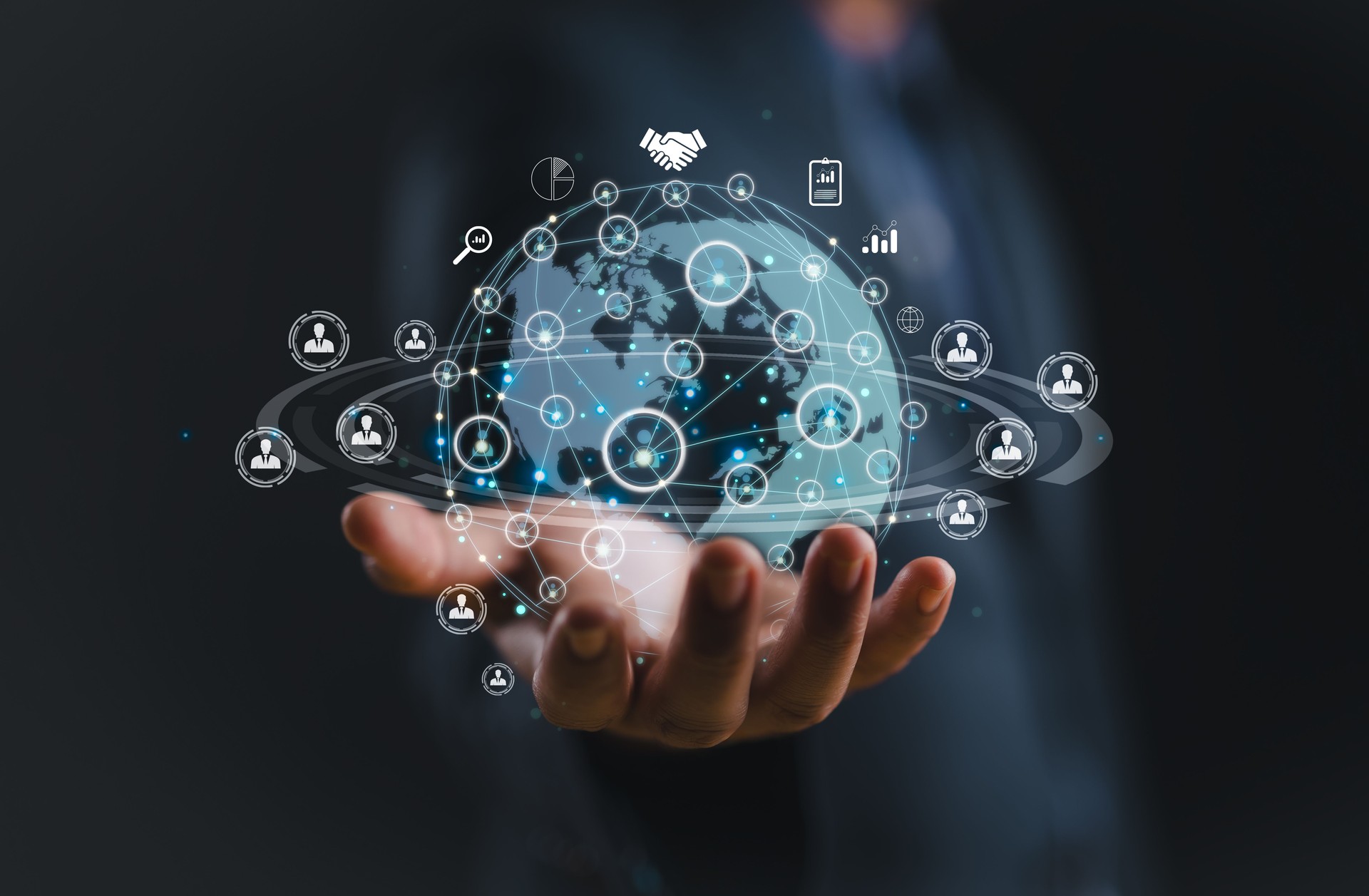 businessman holding Global network connection. Big data analytics and business intelligence concept. World map point and line composition concept of global business.Digital link tech.